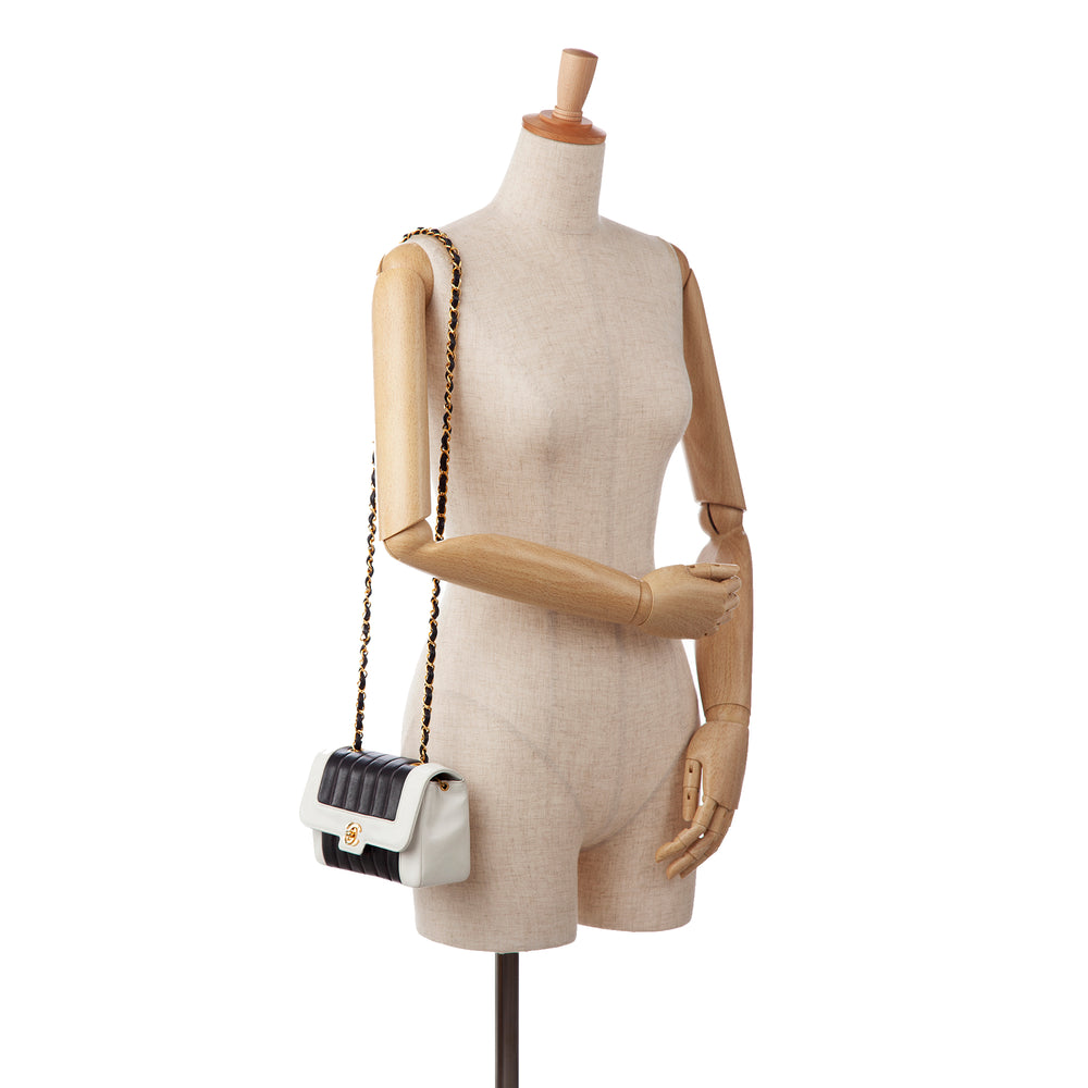 
            
                Load image into Gallery viewer, Chanel Lambskin Mademoiselle Ligne Single Flap Bag Black
            
        
